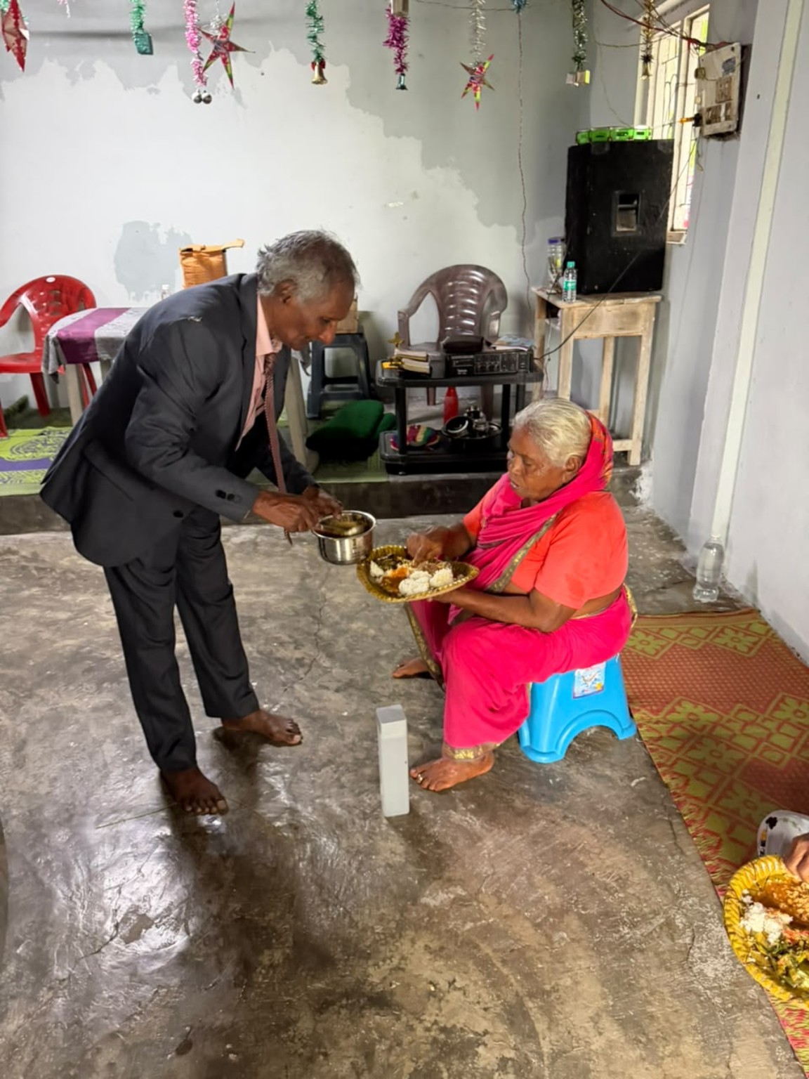 Food and fellowship during a charitable visit